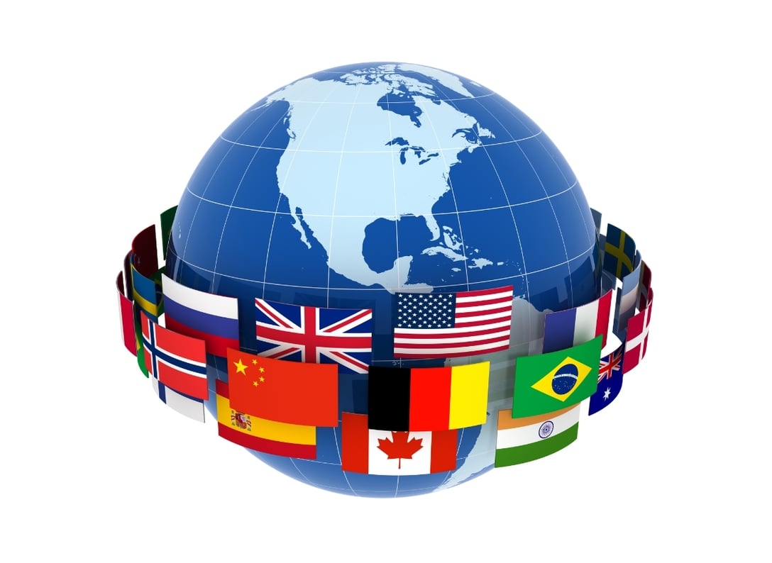 Globo com bandeiras de diferentes países representando a regulamentação nacional dos números 0800